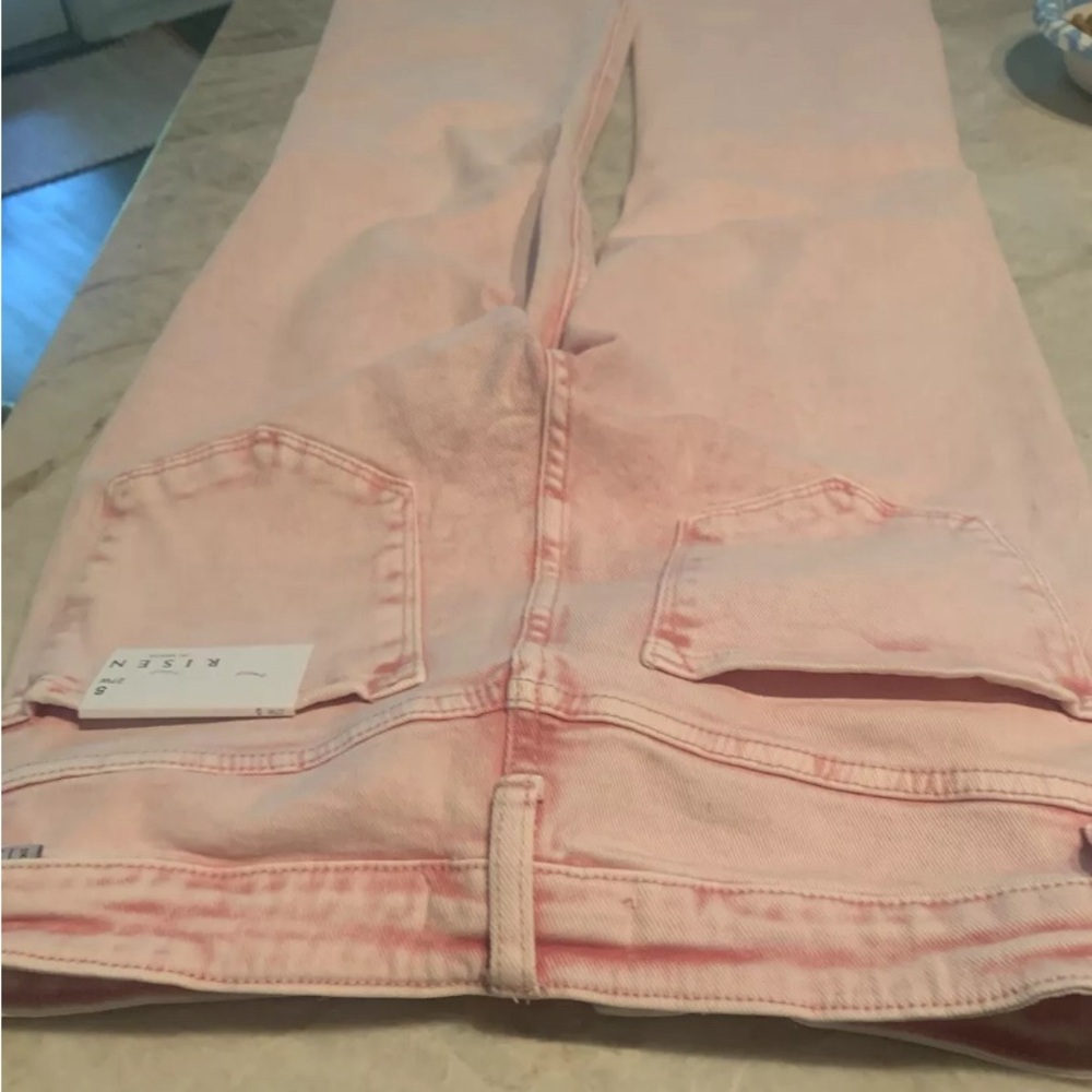 Risen brand jeans pink distressed. New with tags. Size 5/27.